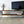 wooden tv stand, dark wood, small tv and narrow sideboard