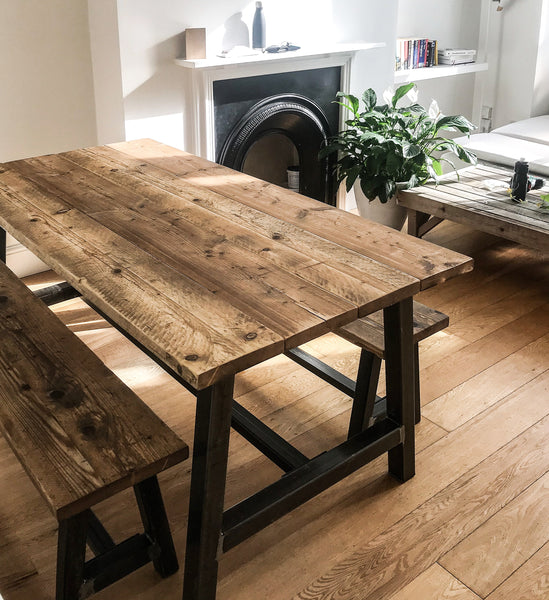 Rustic, industrial, reclaimed timber scaffold board dining table with bench options on bare steel trestle base
