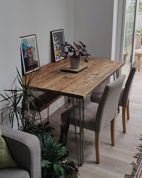 rustic dining table with one bench and two chairs