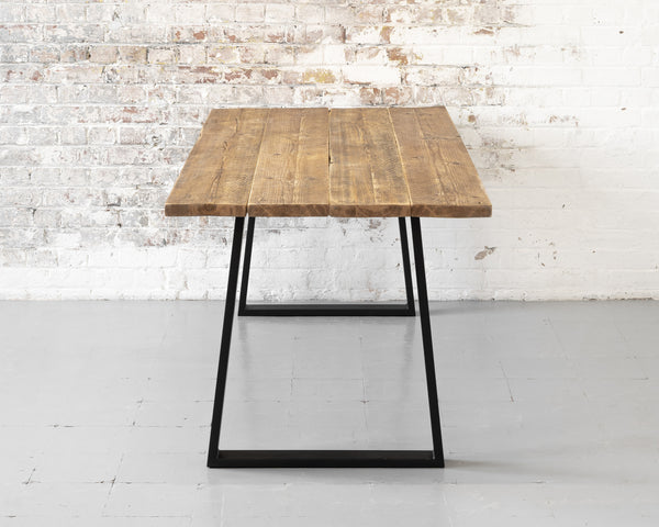 Rustic, industrial, reclaimed timber scaffold board desk on matte black steel trapezium base